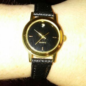 SKC black and gold ladies watch